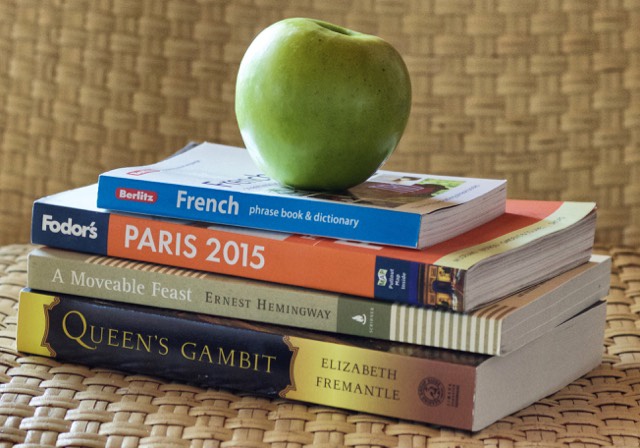 Helpful travel books and fun reads, plus a snack.
